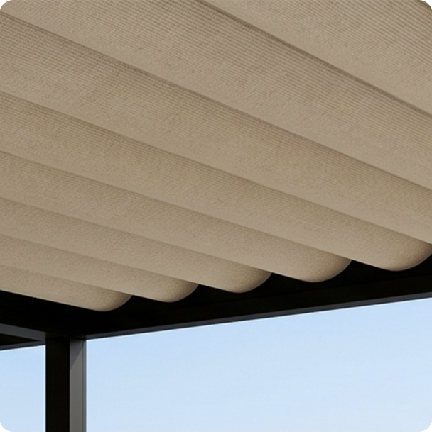 Retractable fabric roof extending over patio
