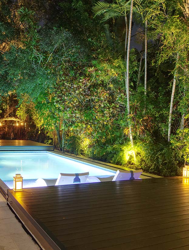 S-LIDE sliding deck pool cover in a Coral Gables residence, pool covered and walkable