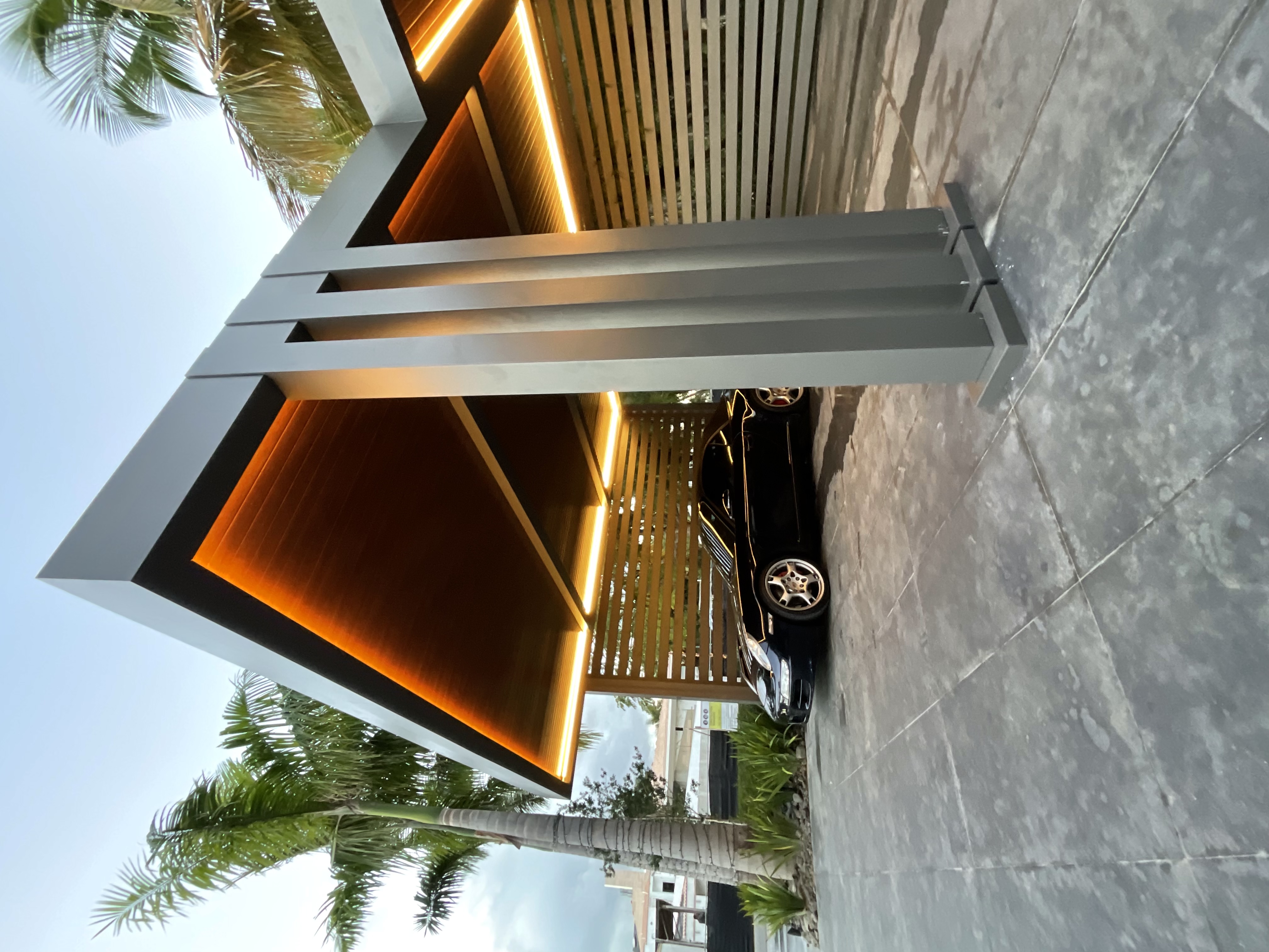 R-CAR aluminum carport installed at a residential driveway