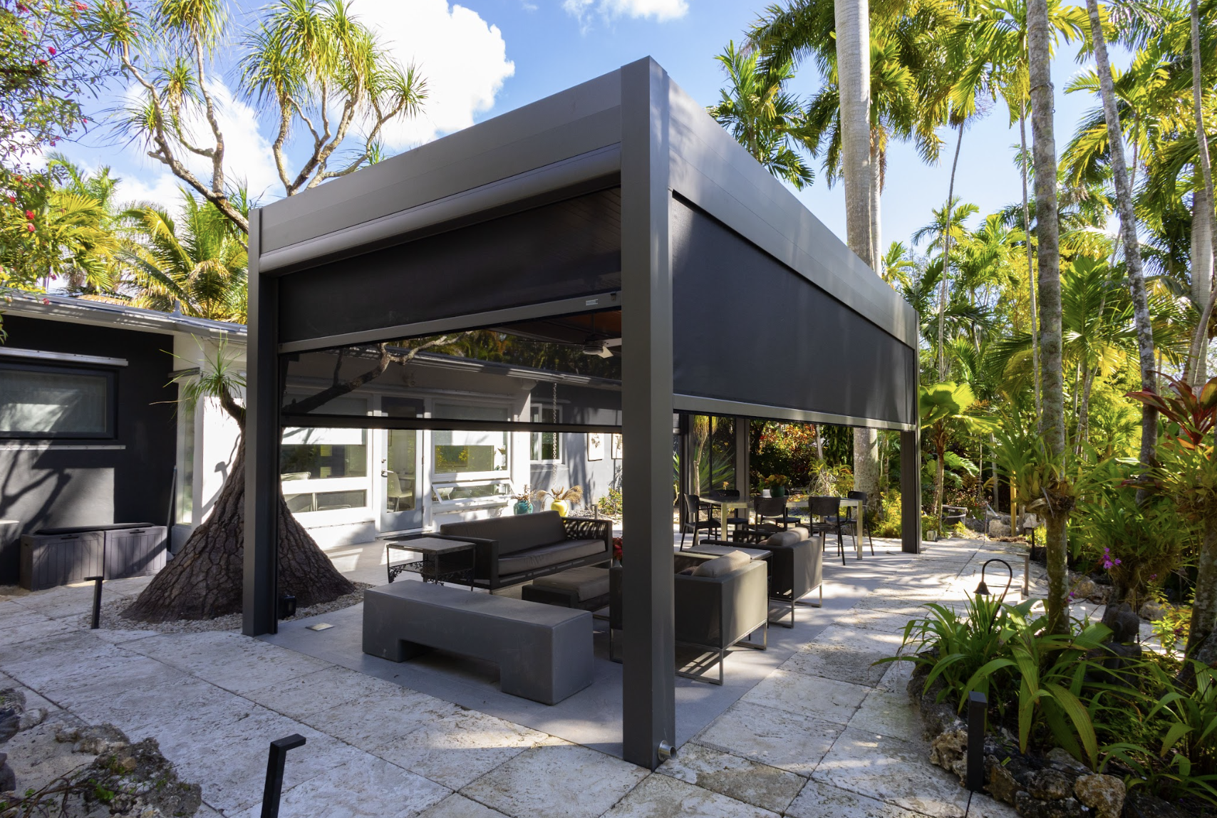 MagnaTrack motorized screen on a covered outdoor space